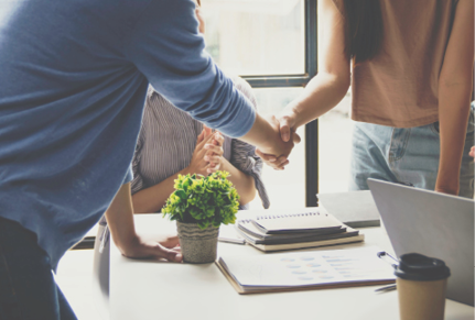 businesspeople shake hands, finish up meetings